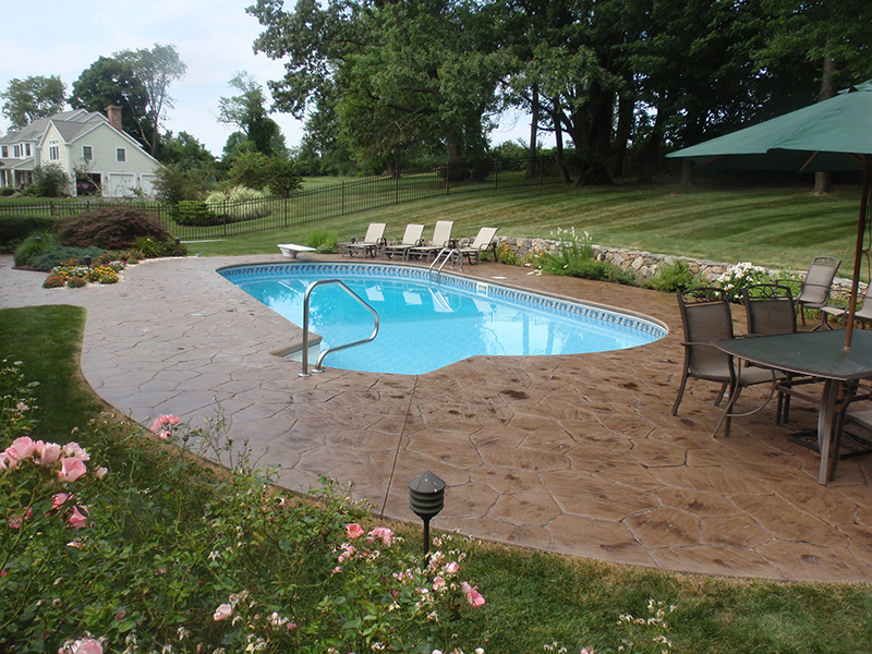 Swimming pool and stamped concrete project example 57